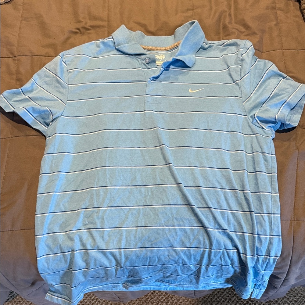 Vintage Nike Men's Sky Blue Polo with Stripes